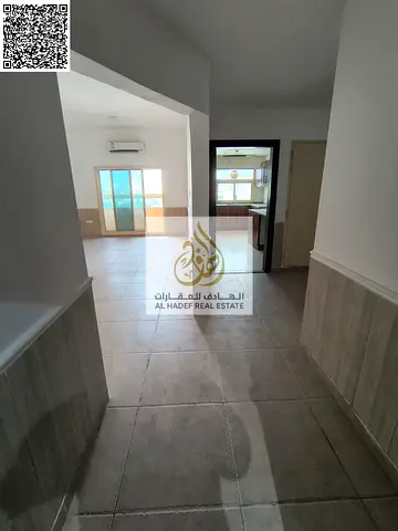 Two-bedroom apartment with a living room, three bathrooms, a balcony, and built-in wardrobes. Two master bedrooms. | At the lowest prices in Ajman. A