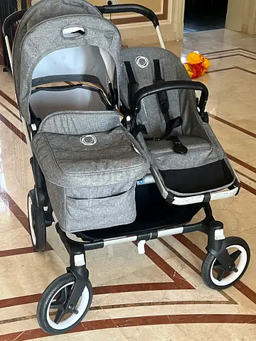 Double tandem stroller (buggy) in grey — good condition