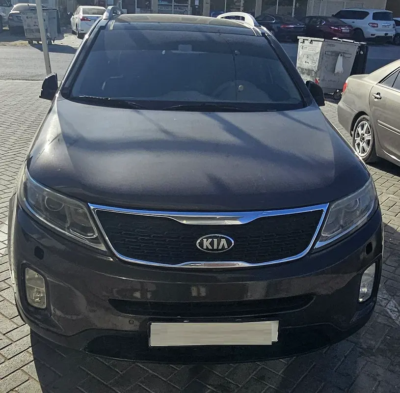 Kia Sorento 2014 — photo 1 of 4