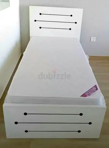 Single white bed frame with mattress - modern design