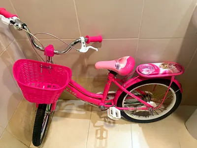 Pink Childrens Bike with Front Basket and Rear Carrier