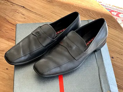 Prada men’s black leather loafers - good condition, size available