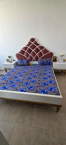 King bed frame with upholstered headboard