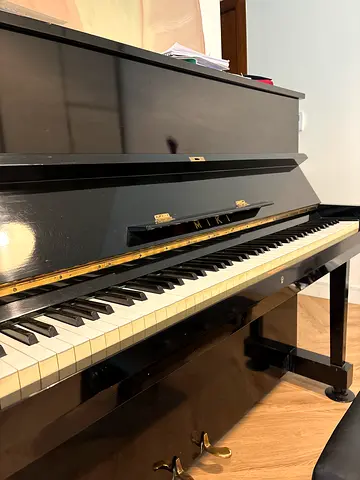 Upright Piano in Gloss Black — Good Condition