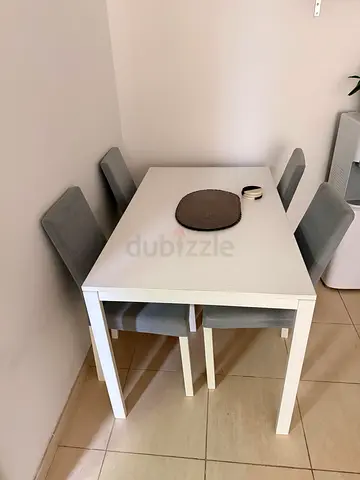 White Dining Table with 4 Grey Chairs - Compact Set
