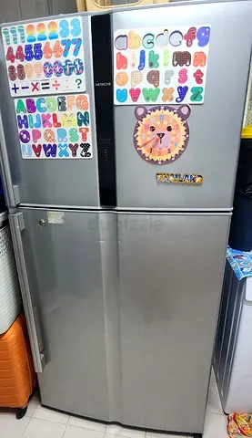 Silver Hitachi Double-Door Refrigerator - Good Working Condition