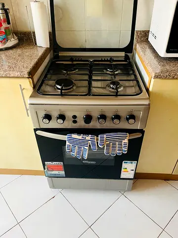 Used 4-Burner Gas Cooker with Oven — Good Working Condition