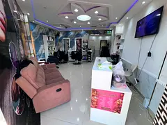 Beauty salon for sale in Rashidiya 1, spacious and well maintained, with Moroccan bath and full ser