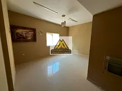 A spacious 2-bedroom apartment is available for annual rent in Al Nuaimiya 2