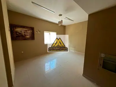 A spacious 2-bedroom apartment is available for annual rent in Al Nuaimiya 2