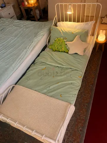 ALMOST NEW IKEA EXTENDABLE KIDS BED WITH MATTRESS AND MATTRESS PROTECTOR