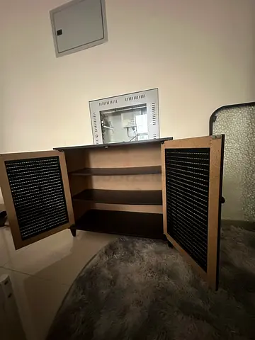 Small wooden cabinet with pair of doors — good condition with a little scratches