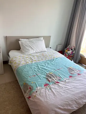 Ikea Single bed 140 x 200 with upholstered headboard — good condition