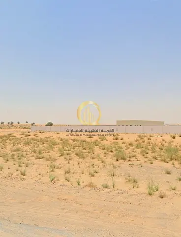 Vacant land for sale in Al Sajaa. Area: 10,000 sq ft. Corner plot.