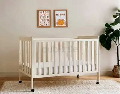 Juniors brand wooden crib for sale