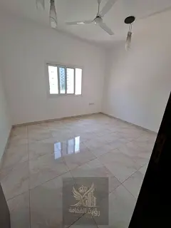Beautiful two-bedroom apartment with a living room in the Al-Qulay'ah area. Central air conditio