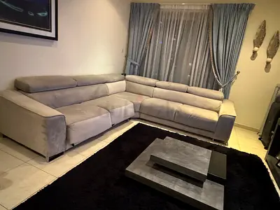 Convertible L-Shaped Sofa Bed + Modern Coffee Table | Good Condition |