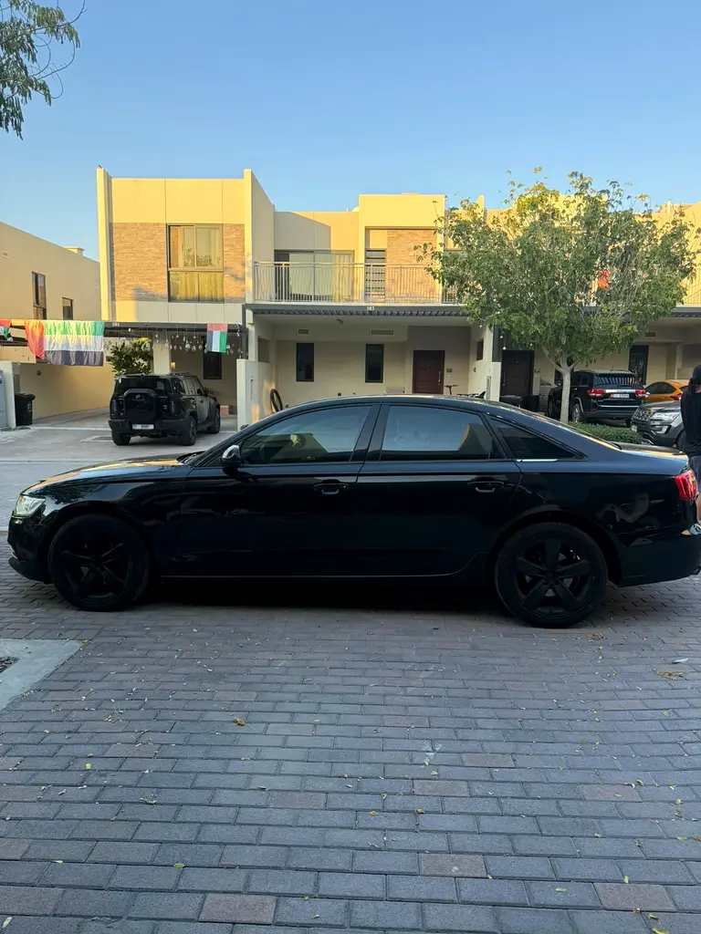 Audi A6 2014 — photo 1 of 14