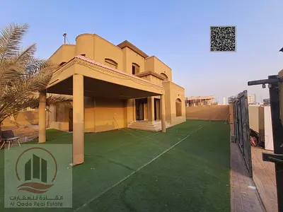 Villa for sale in Ajman, Al Muwaihat area, 5 master bedrooms, majlis + hall, maid's room with bathroom, freehold for all nationalities with bank fina