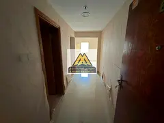 A spacious studio apartment is available for annual rent in Al Nuaimiya 2 - Separate Kitchen Central