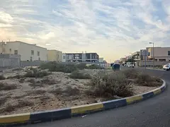 Residential corner plot for sale in Al Qarain 4, Muwailih Suburb