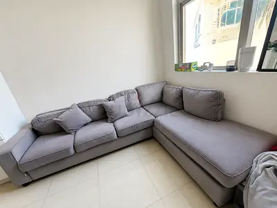 Light grey L-shaped sectional sofa with chaise, good condition 6 seaters