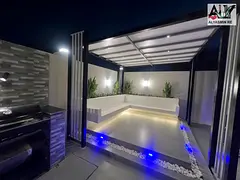 Own a luxurious villa, including registration fees, corner location, modern design, and spacious are