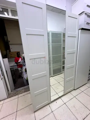 Modern White Wardrobe with Mirrored Center Door