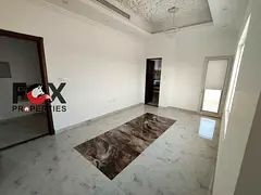 Luxury 3-bedroom apartment for annual rent in Al Alia with 4 bathrooms, balcony, and premium finishi