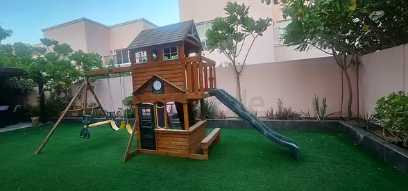 Kidkraft Wooden Outdoor Playset with Slide, 2 Swings, 1 see-saw, and a climbing frame