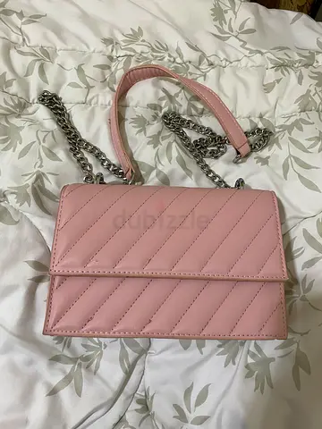 Baby pink shoulder strap bag with silver chains