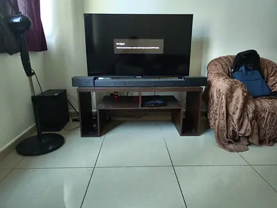 Used Powered Subwoofer - Good Working Condition with good condition TV table free (TV not included)