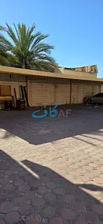 Luxury villa for rent in Al Tarfa, Sharjah, on two streets with expansive land, private annex, maste