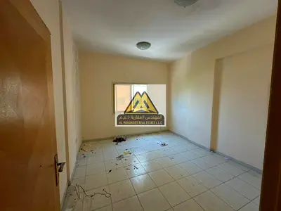 A great opportunity for annual rent in Al Rashidiya 2, Ajman. This spacious one-bedroom apartment with a balcony