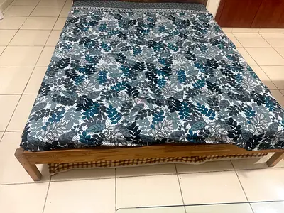 Simple wooden low bed frame with mattress - good condition