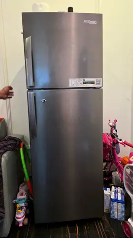 Silver double-door refrigerator - good working condition