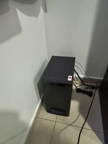Used Powered Subwoofer - Good Working Condition with good condition TV table free (TV not included)