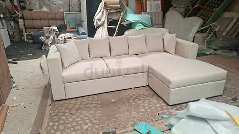 Light beige L-shaped corner sofa with storage - good condition