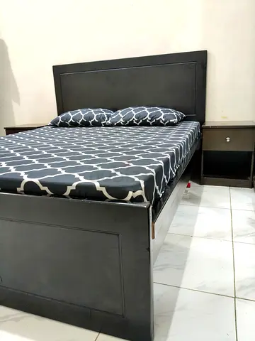 Queen-size wooden bed with mattress with two matching bedside tables - dark finish