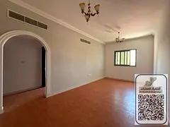 One bedroom and living room with a balcony offering an open view, close to a mosque, central air con