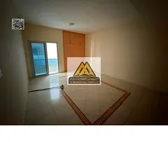 1BR apartment Al Nuaimiya 3 2 baths closed kitchen 2 balconies 27K yearly 6 payments prime location