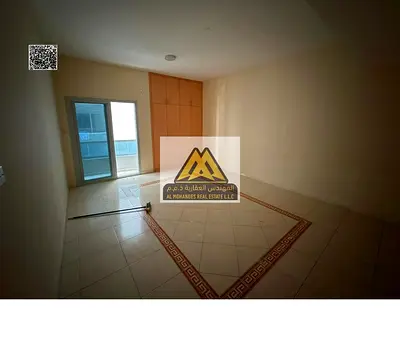 1BR apartment Al Nuaimiya 3 2 baths closed kitchen 2 balconies 27K yearly 6 payments prime location parking ready to move in