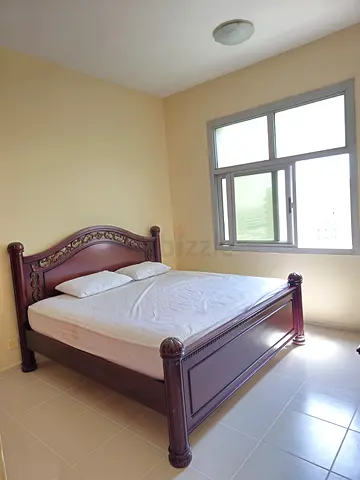 Solid wooden king-size bed with mattress - good condition