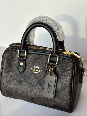 Coach mini sling bag
