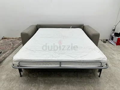 Brand new condition pure leather Natuzzi sofabed