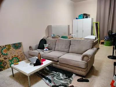 Light beige three-seater sofa in good condition