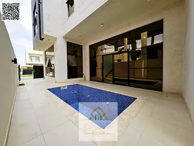 Luxury villa for sale, price includes electricity, water, and air conditioning, with a swimming pool, two floors, and a rooftop.