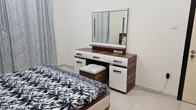 Master room with attached batch and cabinet