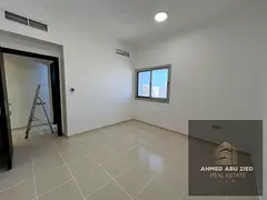 2BR hall with balcony and spacious layout for annual rent on Etihad Street next to Emirates Markets.
