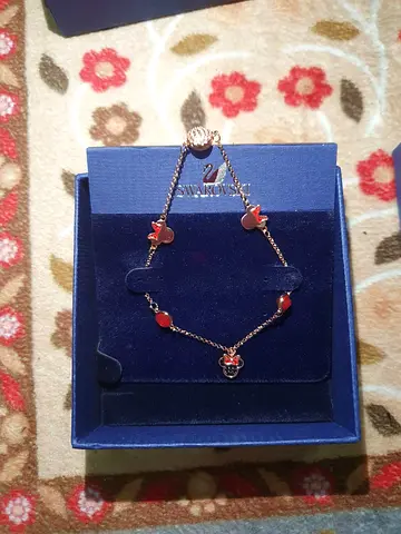 Swarovski rose-gold plated bracelet with heart charms (like new)
